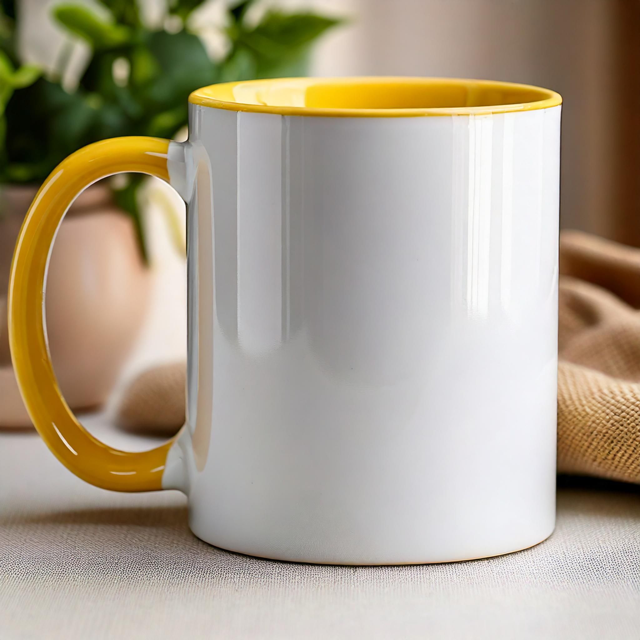 Ceramic mug with yellow handle and interior
