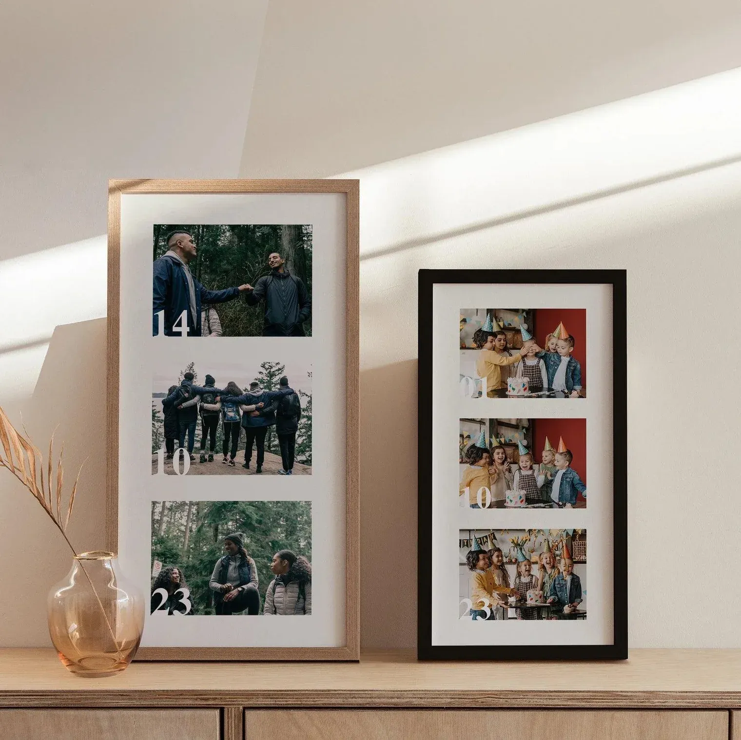 Framed prints on wooden shelf