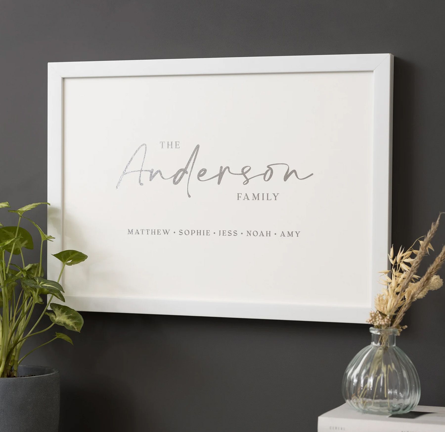 Framed metallic foil family name print with elegant script typography
