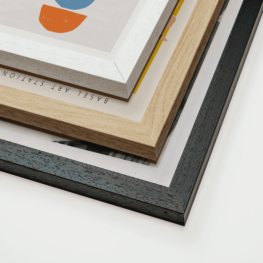 Premium frame options in black, white and oak finishes